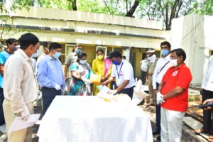 Fr Bellamkonda Sudhakar, Executive Director, BSK, handing over 2500 Face Masks to Hon'ble Governor at Rajbhavan, Hyderabad